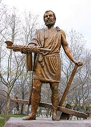 Statue en pied de Cincinnatus, tenant d'une main les faiseaux, et de l’autre sa charrue.