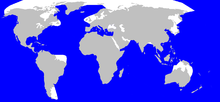 Carte du monde montrant la répartition du cachalot : Tous les grands océans sont colorés, à l'exception des zones marines autour du pôle Nord, de côtes de Guyane et de la pointe sud-américaine ainsi que la mer Rouge, la bande d'eau entre l'Australie et la Papouasie-Nouvelle Guinée (se référer au texte pour plus de détails).
