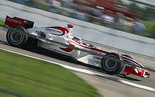 Photo de Takuma Sato sur la SA05 au GP des USA 2006