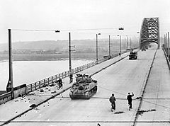 British XXX Corps cross the road bridge at Nijmegen .jpg