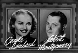 Carole Lombard and Robert Montgomery in Mr and Mrs Smith trailer.jpg