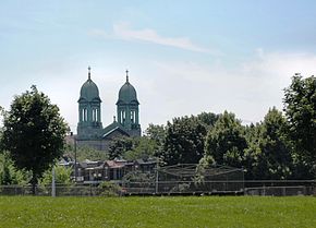 Clocher de l'église Saint-Marc vu du parc BeaubienLocalisation de Rosemont–La Petite-Patrie dans Montréal.Logo de l'arrondissement.