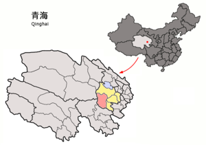 Localisation du siège du district de Xinghai (en rose) dans la préfecture de Hainan (en jaune)