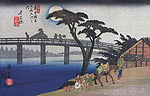 Hiroshige, Man on horseback crossing a bridge.jpg