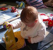 Baby exploring books.jpg