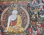 Peinture chinoise illustrant plusieurs démons menaçant Sakyamuni de diverses armes.