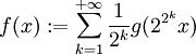 f(x):=\sum_{k=1}^{+\infty} \frac{1}{2^k} g(2^{2^k} x)