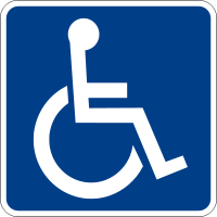 Pictogramme blanc sur fond bleu d'une personne en fauteuil roulant