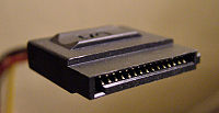 A 15-pin Serial ATA power connector.