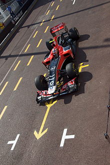 Photo de Jérôme d'Ambrosio dans la voie des stands de Monaco lors des essais libres.