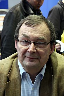 Bernard Lecomte durant une séance de dédicace lors de l'édition 2011 de la Foire du livre de Bruxelles.
