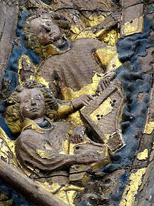 Première représentation connue d'un clavecin, sculpture d'autel provenant de la cathédrale de Minden. L'ange de gauche joue du psaltérion.