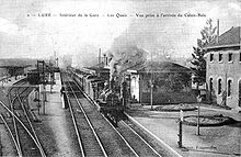 L'intérieure de la gare et l'arrivée du train à vapeur reliant Calais à Bâle au début des années 1900.
