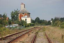 La gare de Neufmarché désormais désaffectée et envahie par la végétation.