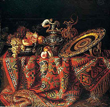 Hupin, Jacques - -A still life of peaches, grapes and pomegranates in a pewter bowl, an ornate ormolu plate and ewers, all resting on a table draped with a carpet - 17th century .jpg
