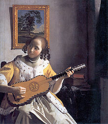 Joueuse de guitare par Johannes Vermeer (1632–1675)