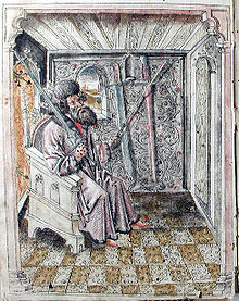 Maître d'escrime assis, probablement représentant Liechtenauer, fol. 2v du traité de combat de Peter von Danzig (1452)