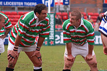 Photo de Martin Johnson et Graham Rowntree côte à côte les mains sur les genoux.