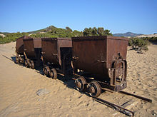 Photographie de wagonnets sur le trajet vers l'embarcadère