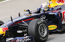 Photographie de Vettel dans le cockpit de sa monoplace