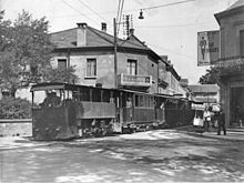 Photo prise dans l'entre-deux-guerres, montrant le tramway tracté par une locomotive Buffaud et Robatel, prise sans doute à Audincourt