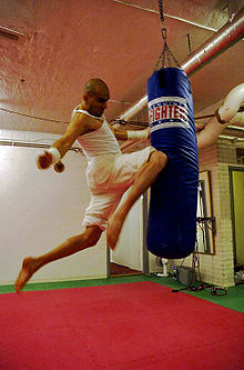 Umar Khan performing a flying knee
