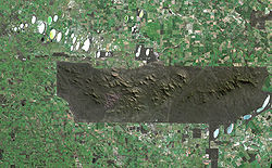Image satellite du parc, les limites nettes de tous les côtés du parc montrent la passage brutal des terrains cultivés aux zones protégées.