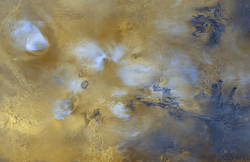 Image satellite du dôme de Tharsis avec à droite Valles Marineris et en haut à gauche l'Olympus Mons.