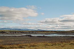 Þjórsá près de Hekla avec les glaciers Tindfjallajökull (à gauche) et Eyjafjallajökull (à droite).