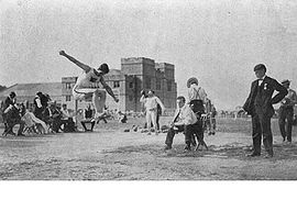 Myer Prinstein in action in the long jump during 1904 Summer Olympics.jpg