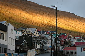 Vagur, Faroe Islands, in the winter, sunlight on slope.JPG