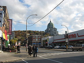 Aperçu du chemin de la Côte-des-Neiges et vue sur l'Oratoire Saint-Joseph.Localisation de Côte-des-Neiges–Notre-Dame-de-Grâce dans Montréal.  Logo de l'arrondissement.