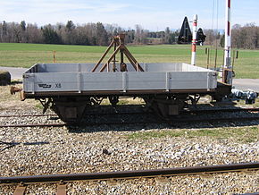  Wagon-touret X6 utilisé pour la pose de câbles et lignes aériennes, en stationnement à Sugnens.